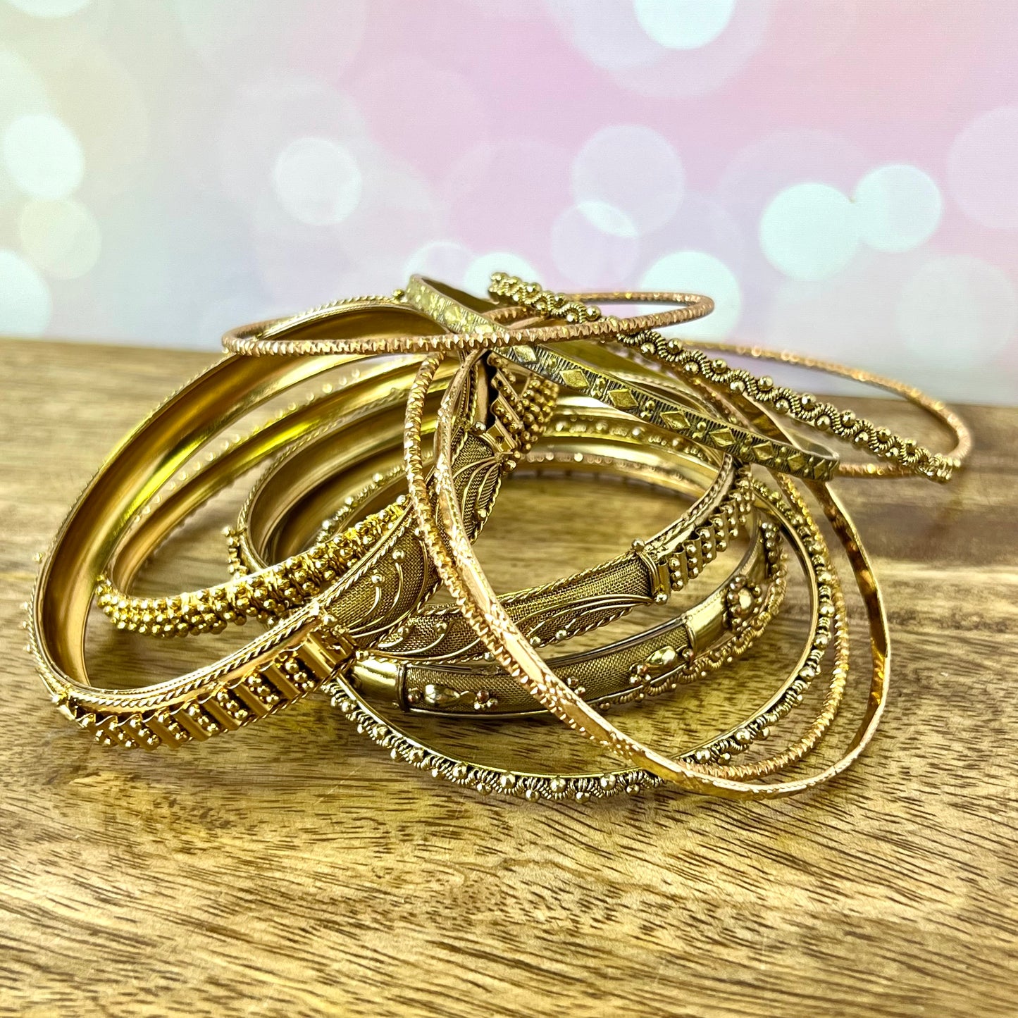 Vintage Gold Tone Bracelet Stack with 11 Textured Bangles