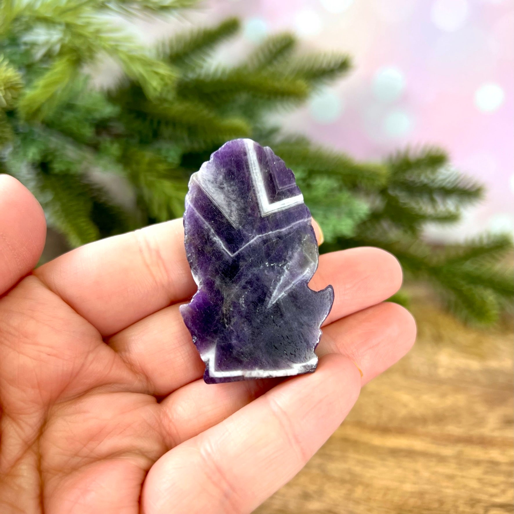 a person holding a piece of rock in their hand
