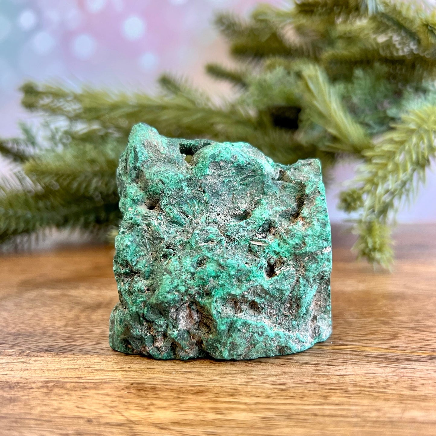 Cut slab of Malachite. Unpolished with a frosted finish. The back is natural and raw.