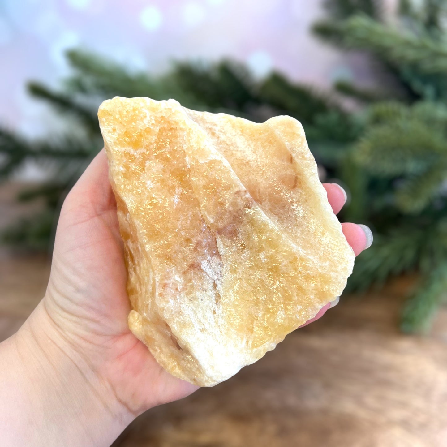 Image of a large, rough chunk piece of yellow Calcite crystal from Mexico. Very sunny color with a darker band. Rough on all edges, with a cylinder cut out on one side.