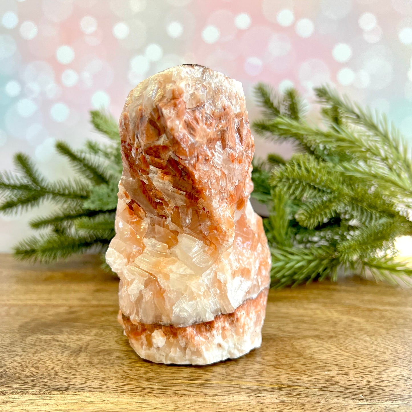 Image of a large, rough chunk piece of red Calcite crystal from Mexico. Has bands of light and dark color. Rough on all edges and rectangular in shape.