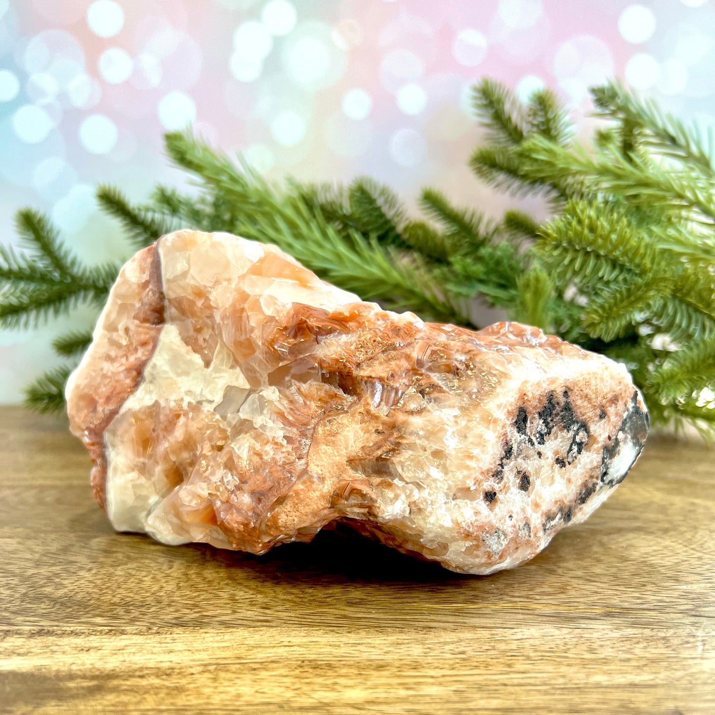 Image of a large, rough chunk piece of red Calcite crystal from Mexico. Has bands of light and dark color. Rough on all edges and rectangular in shape.