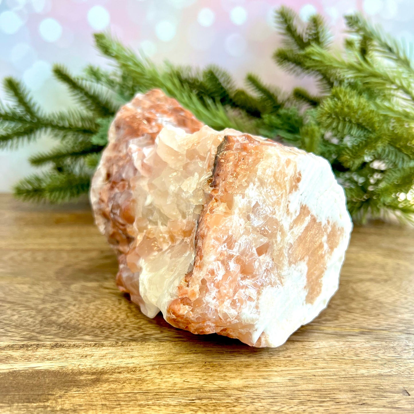 Image of a large, rough chunk piece of red Calcite crystal from Mexico. Has bands of light and dark color. Rough on all edges and rectangular in shape.