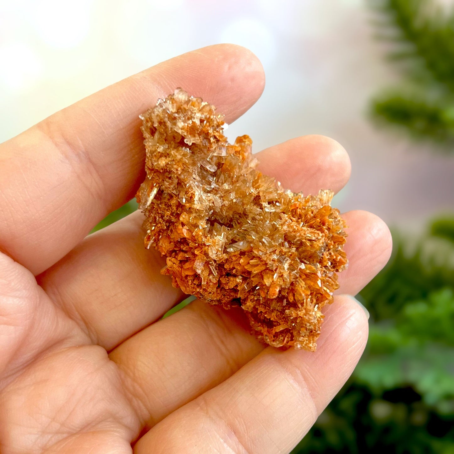 Creedite crystal specimen in rusty brown color