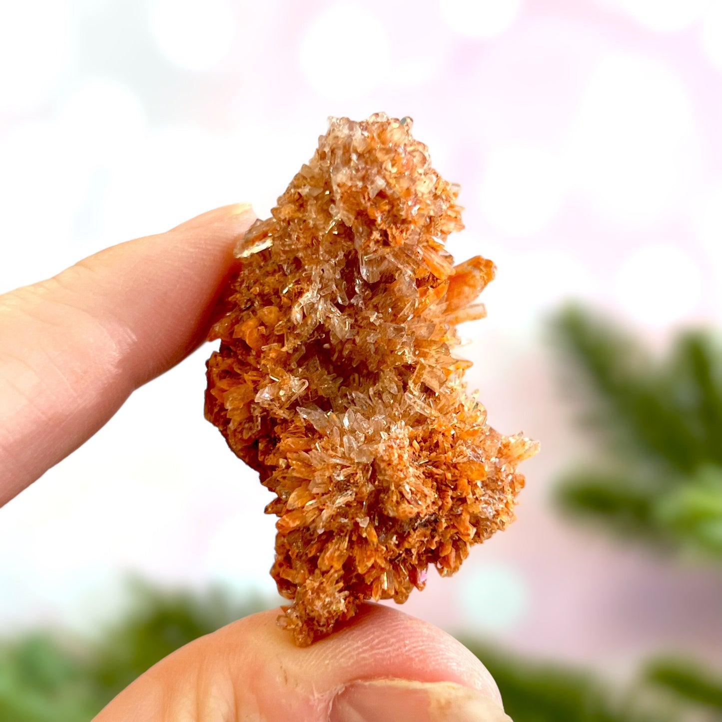 Creedite crystal specimen in rusty brown color