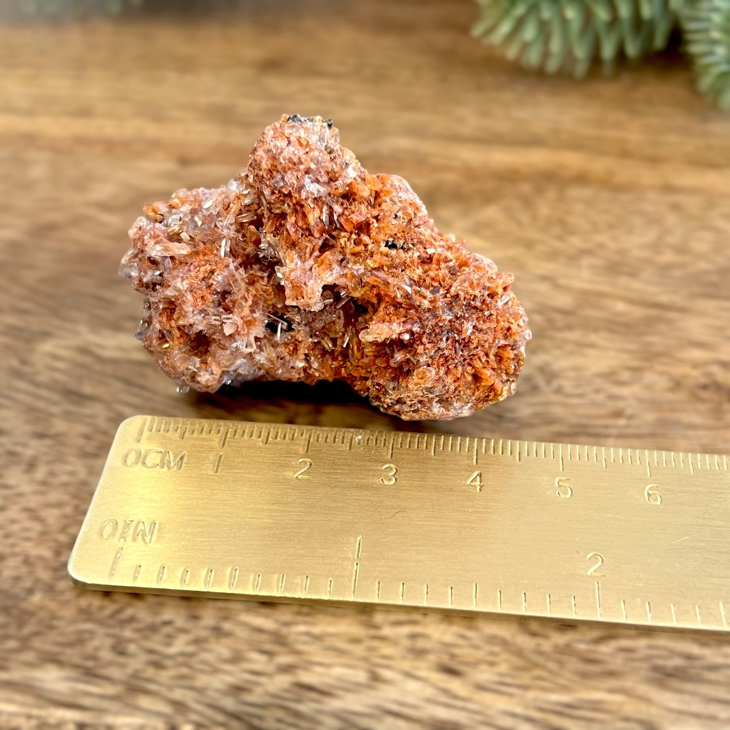 Creedite crystal specimen in rusty brown color