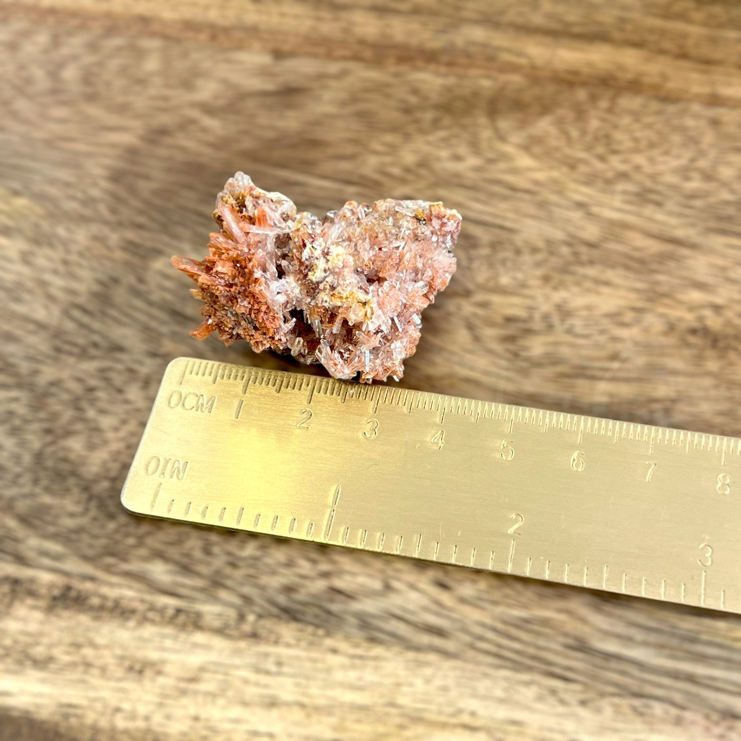 Creedite crystal specimen in rusty brown color