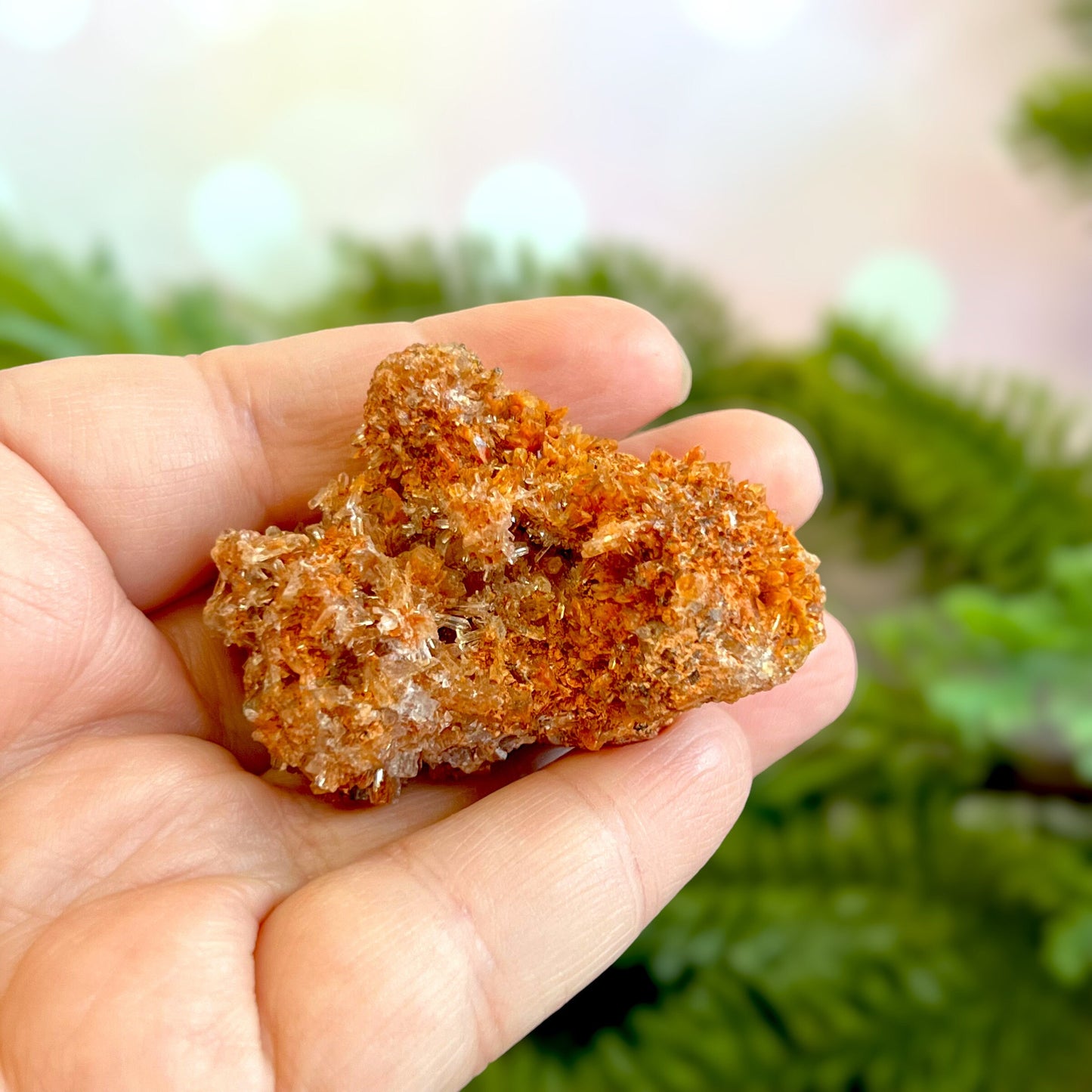 Creedite crystal specimen in rusty brown color