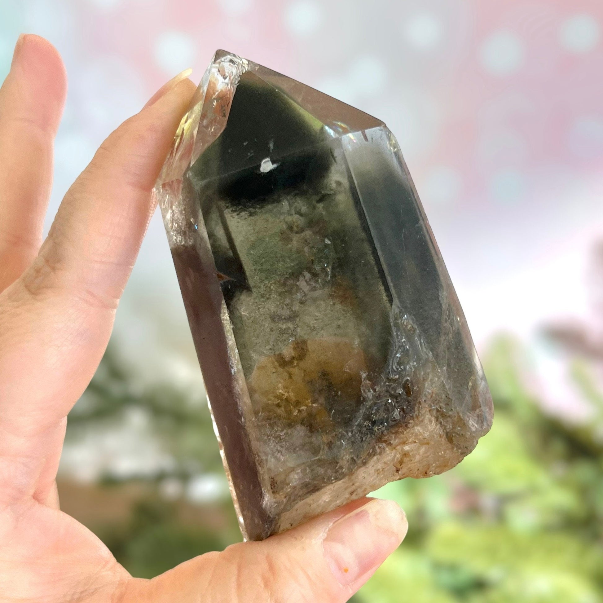 Polished Lodolite Garden Quartz with a raw bottom, from Brazil.