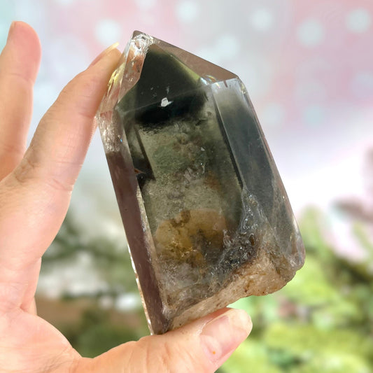 Polished Lodolite Garden Quartz with a raw bottom, from Brazil.