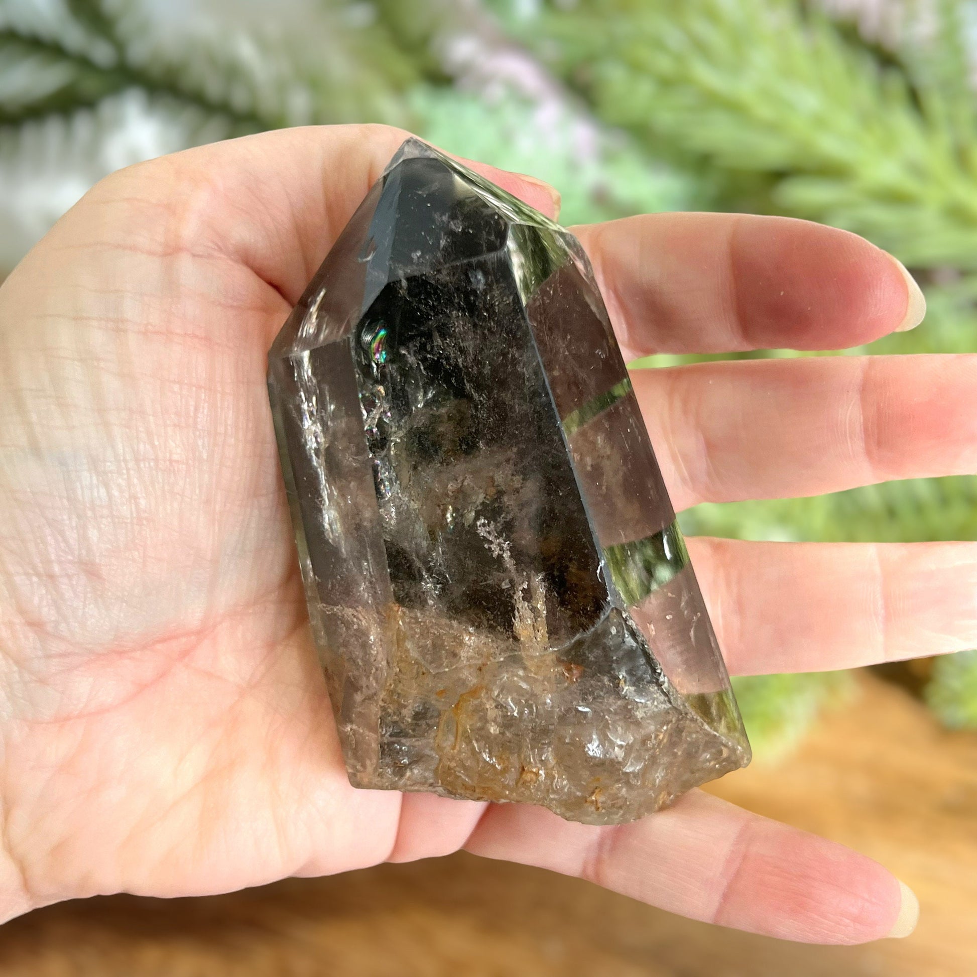 Polished Lodolite Garden Quartz with a raw bottom, from Brazil.