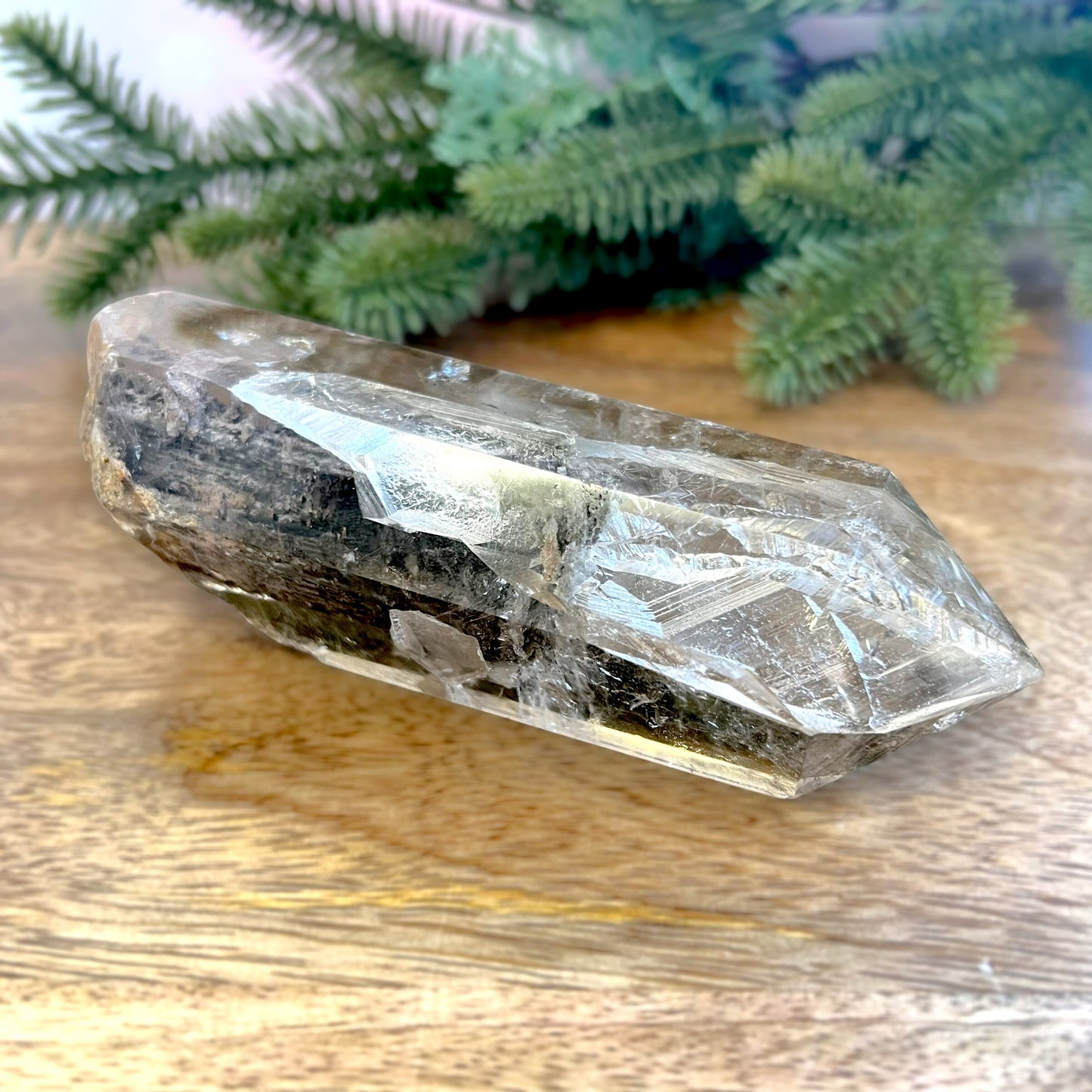 Polished Lodolite Garden Quartz with a raw bottom, from Brazil.