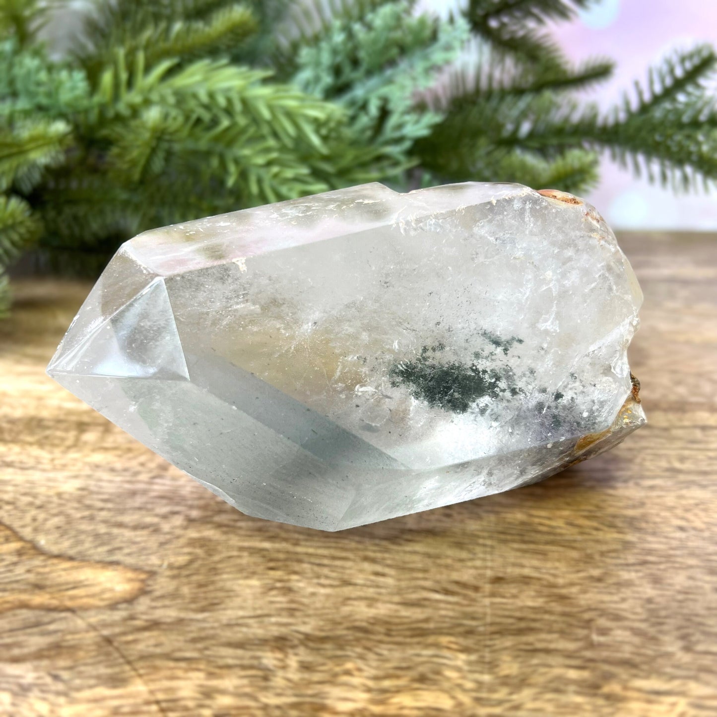 Polished Lodolite Garden Quartz with a raw bottom, from Brazil.