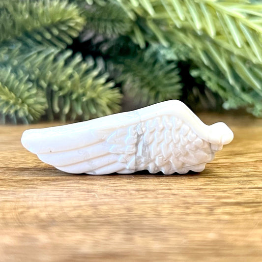 Natural and authentic Magnesite carved crystal cabochon. This Stone Cabochon has been carved into an angel wing