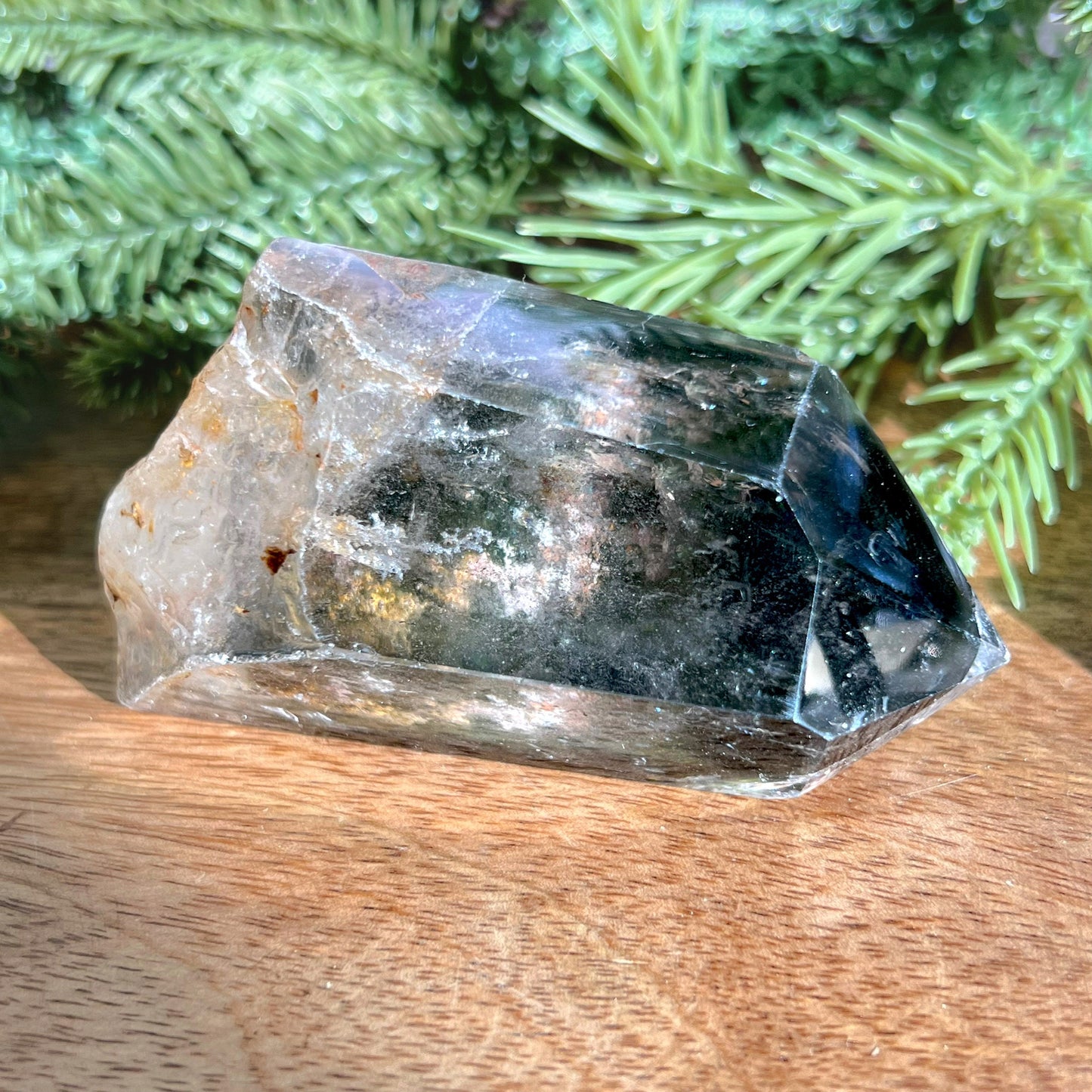 Polished Lodolite Garden Quartz with a raw bottom, from Brazil.