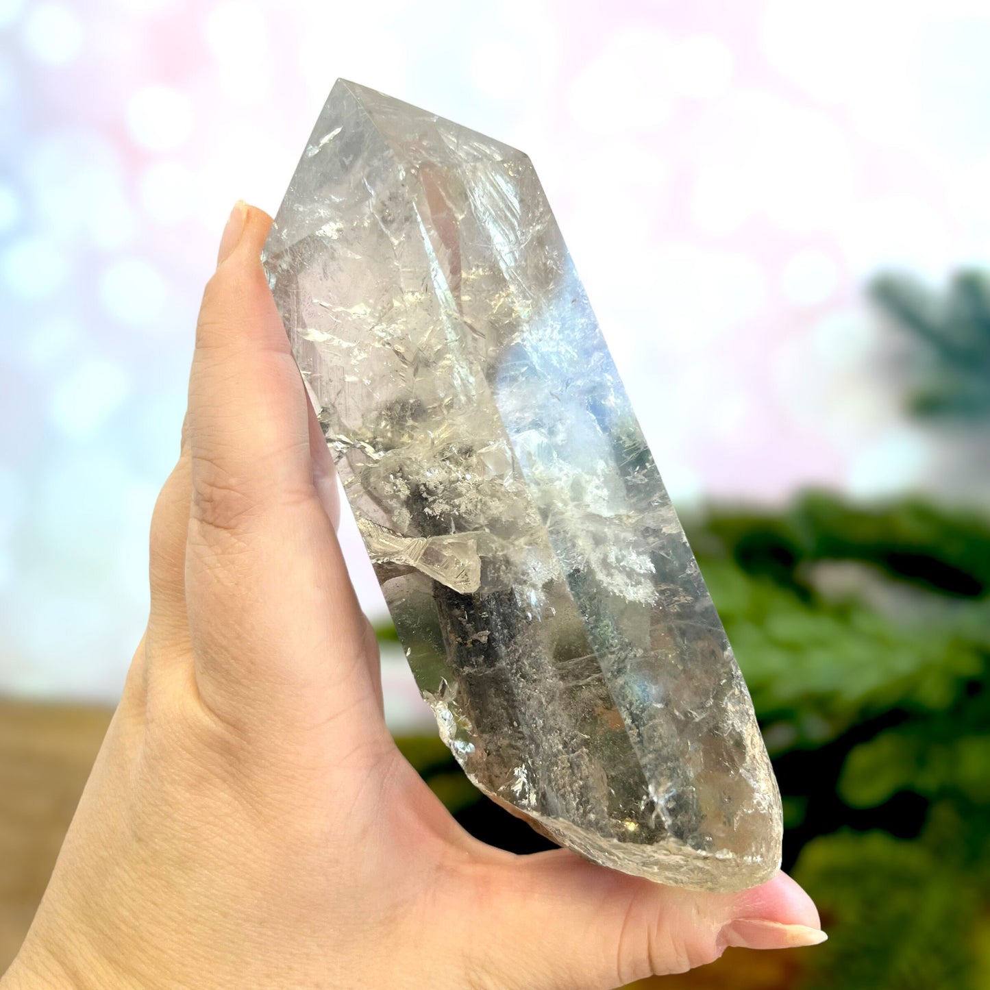 Polished Lodolite Garden Quartz with a raw bottom, from Brazil.