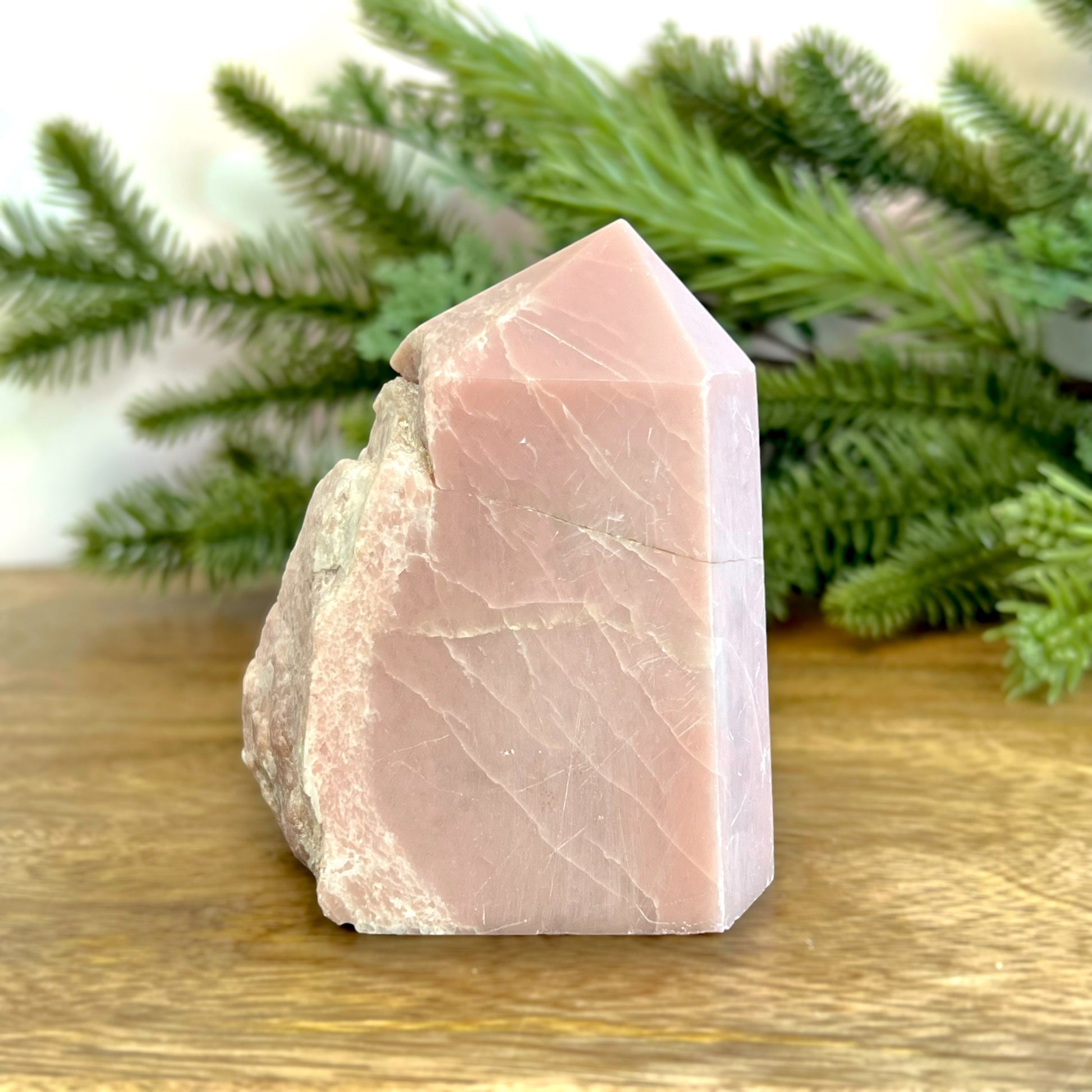 Pink Opal crystal Tower with one face raw edge. Possibly repaired crack.
