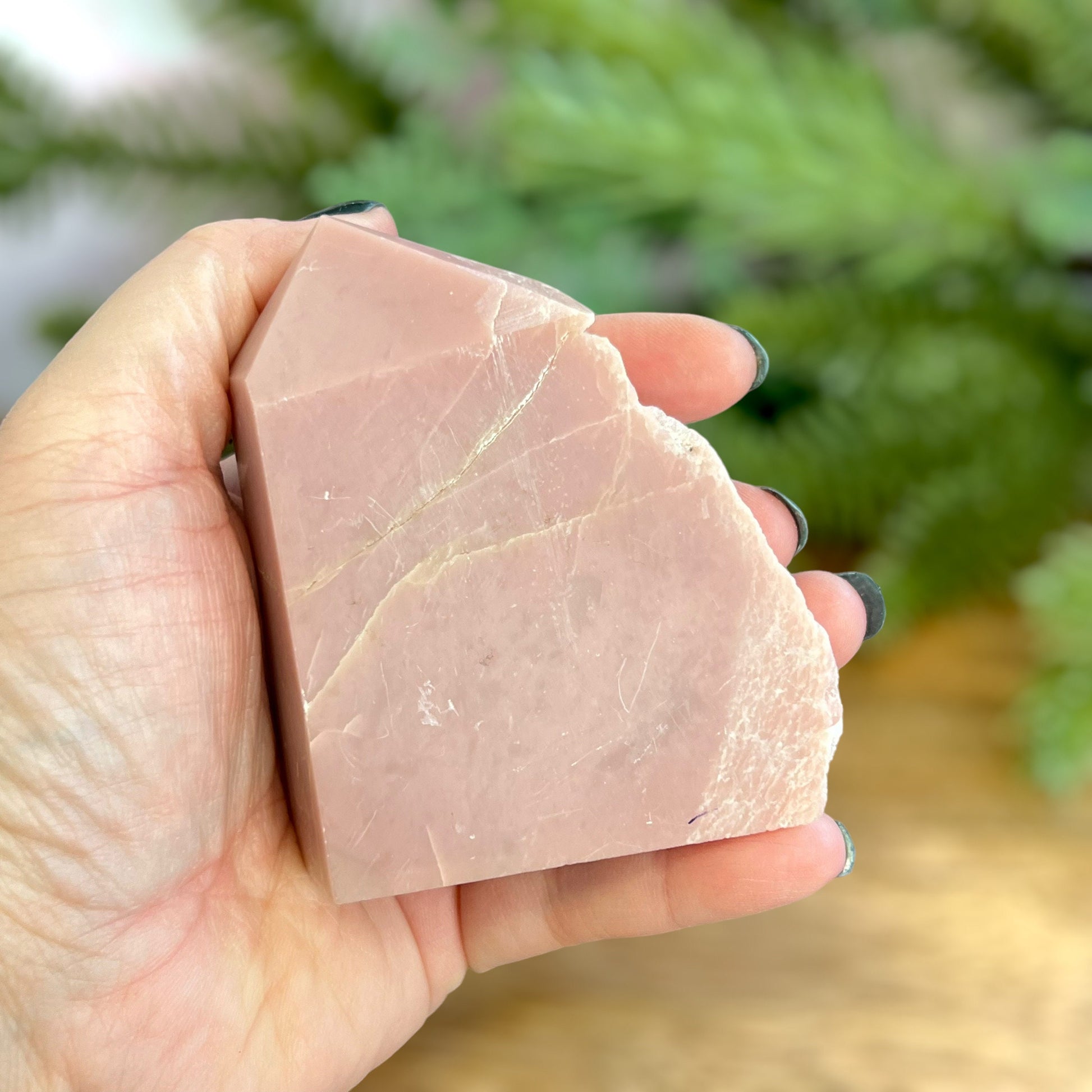 Pink Opal crystal Tower with one face raw edge. Possibly repaired crack.