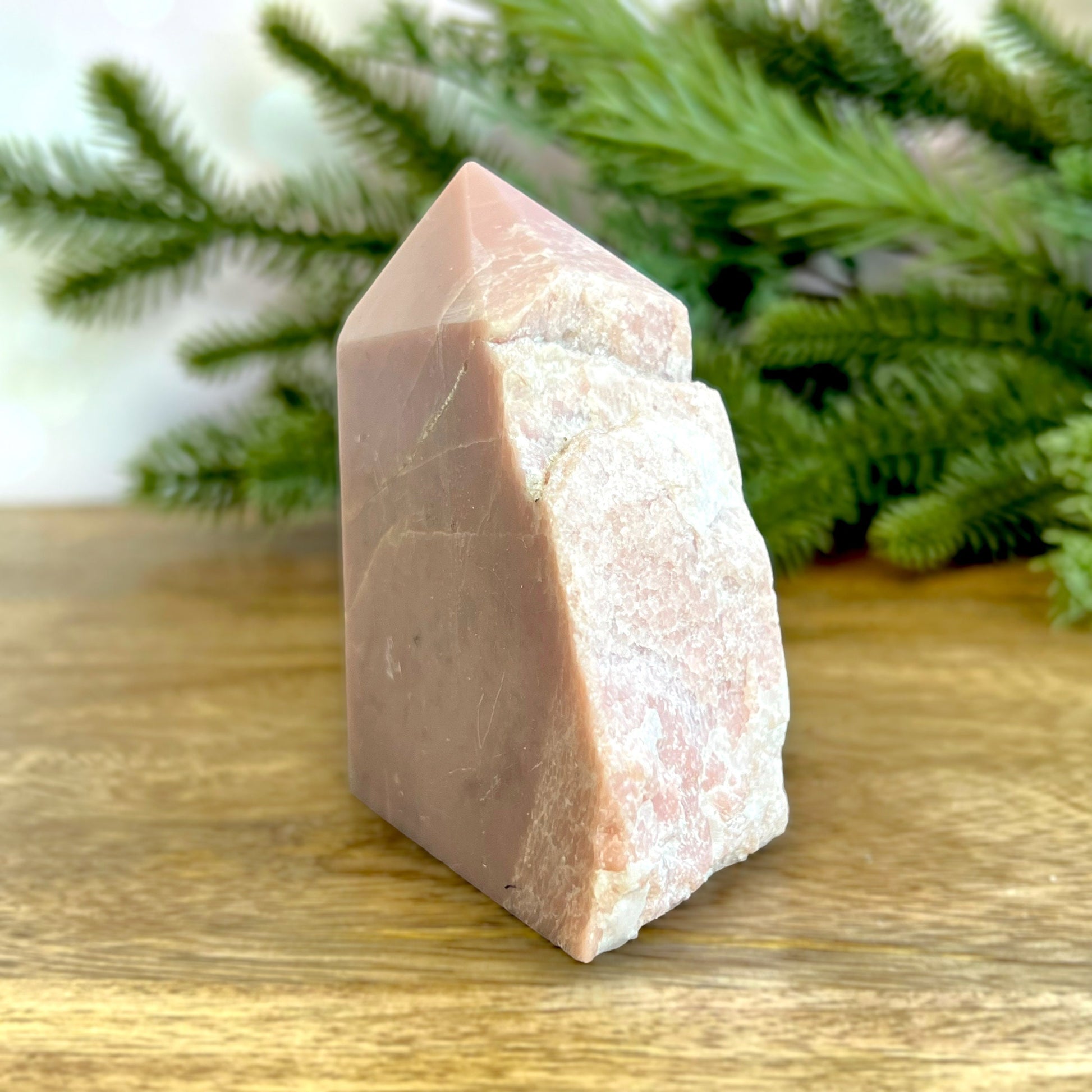 Pink Opal crystal Tower with one face raw edge. Possibly repaired crack.