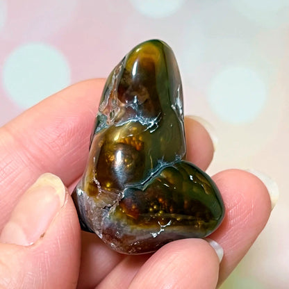 Flashy fire agate tumbled crystal stone