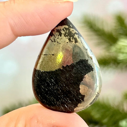 Teardrop shaped pyrite and schist stone cabochon