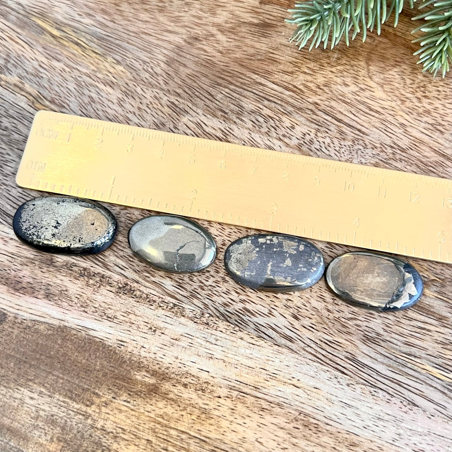 a wooden ruler sitting on top of a wooden table