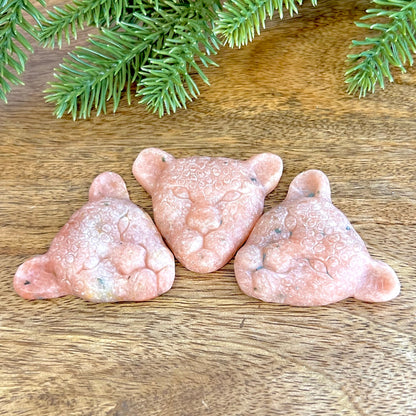 Group of three Orange Calcite carved stone cabochons in the shape of leopard heads