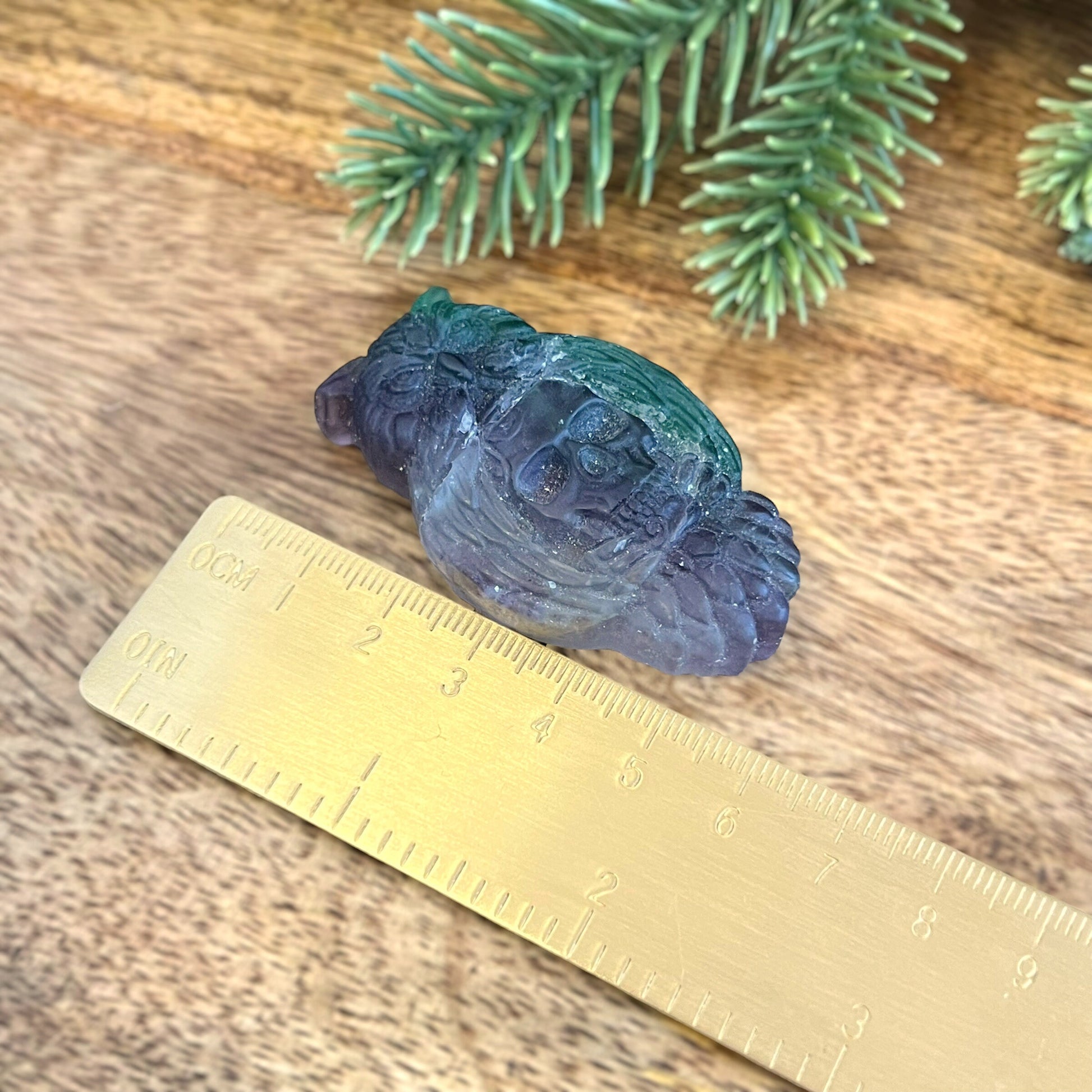 Rainbow Fluorite Crystal carved stone cabochon featuring an owl and human skull