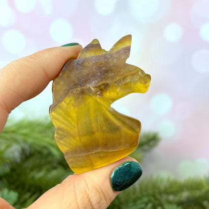 Yellow Fluorite carved stone cabochon featuring the bust of a Unicorn