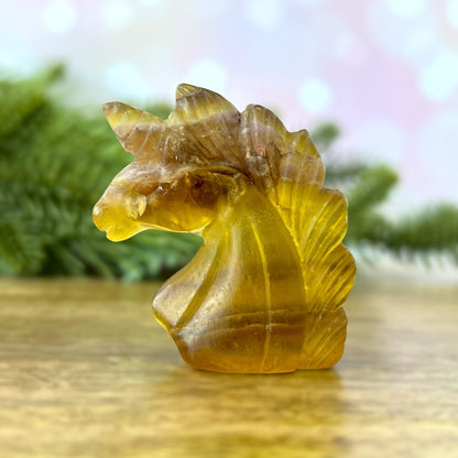 Yellow Fluorite carved stone cabochon featuring the bust of a Unicorn