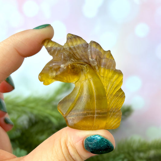 Yellow Fluorite carved stone cabochon featuring the bust of a Unicorn