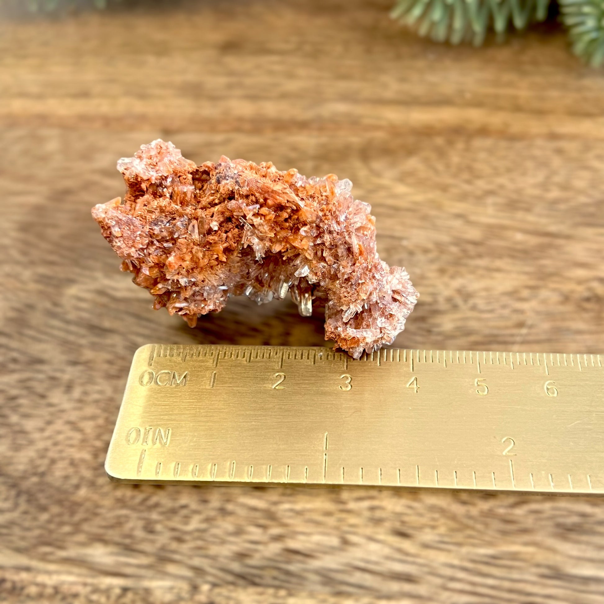 Creedite crystal specimen in rusty brown color