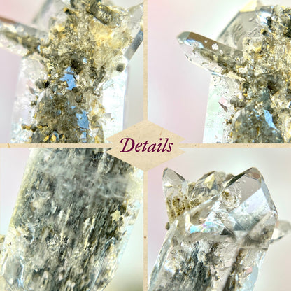 Close up of a small garden Quartz crystal point with chlorite inclusions. This mineral specimen is also called Lodolite, and is natural.