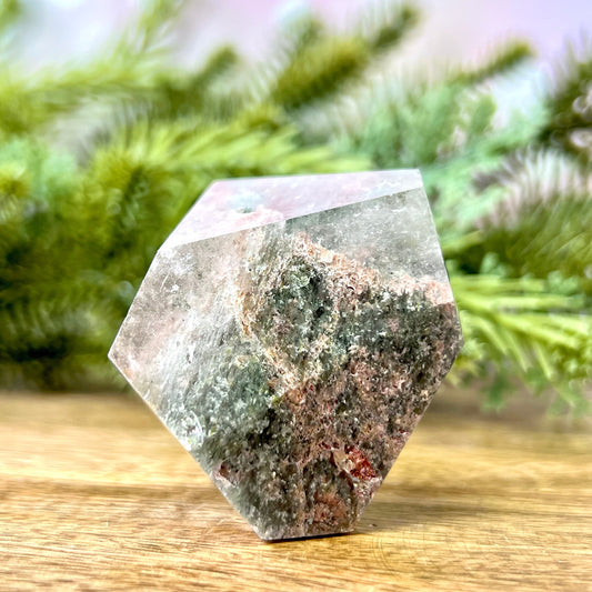 Natural Garden Quartz Crystal cut into a geometric shape and polished