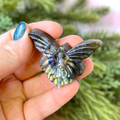 Labradorite Crystal cabochon carved into the shape of a fairy with large butterfly wings