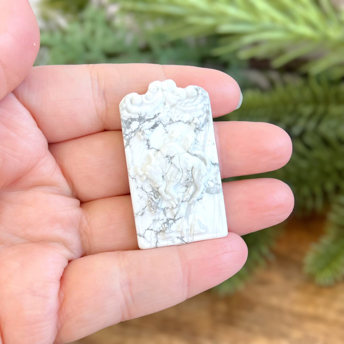 Natural and authentic Magnesite carved crystal cabochon. This Stone Cabochon has been carved into the Taurus bull zodiac sign.