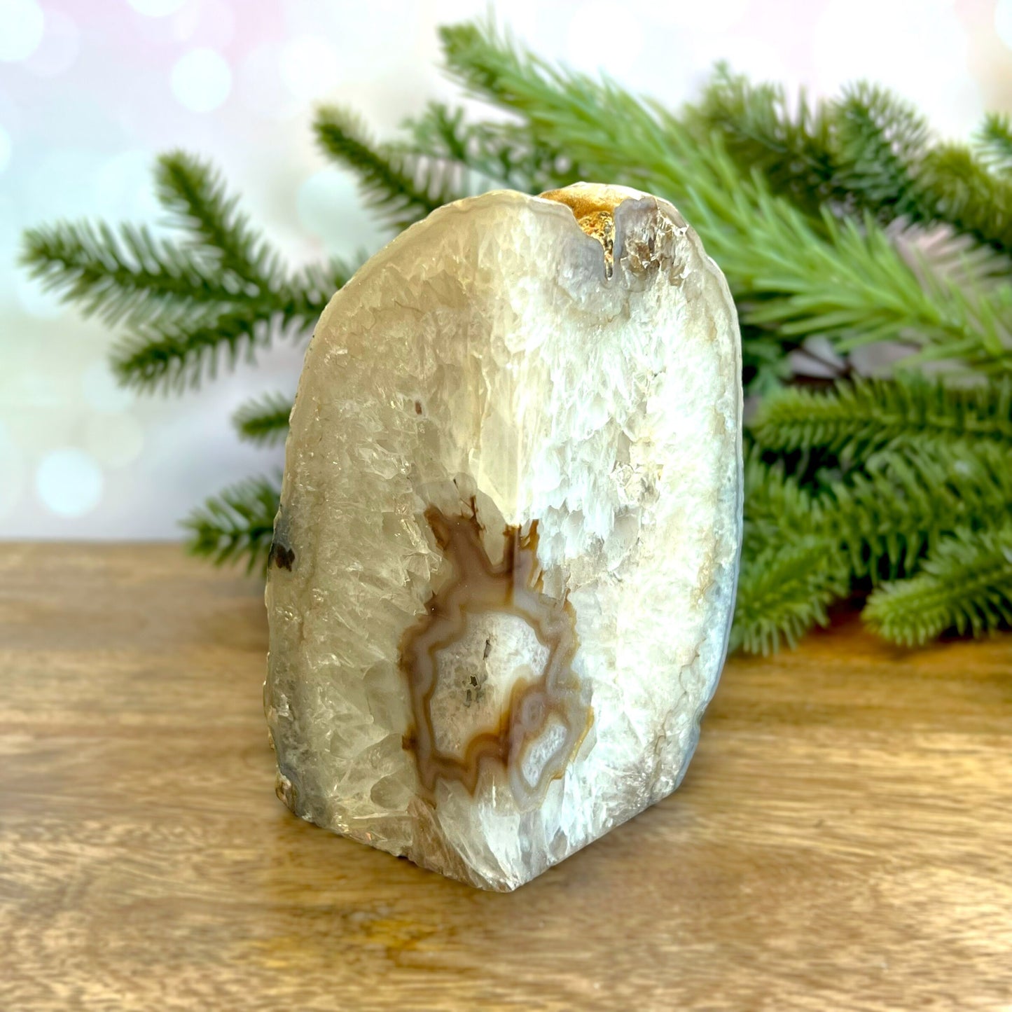 Natural Agate Bookend. Features a slice of cut crystal with raw geode edge and polished inside. Not dyed or heat treated.