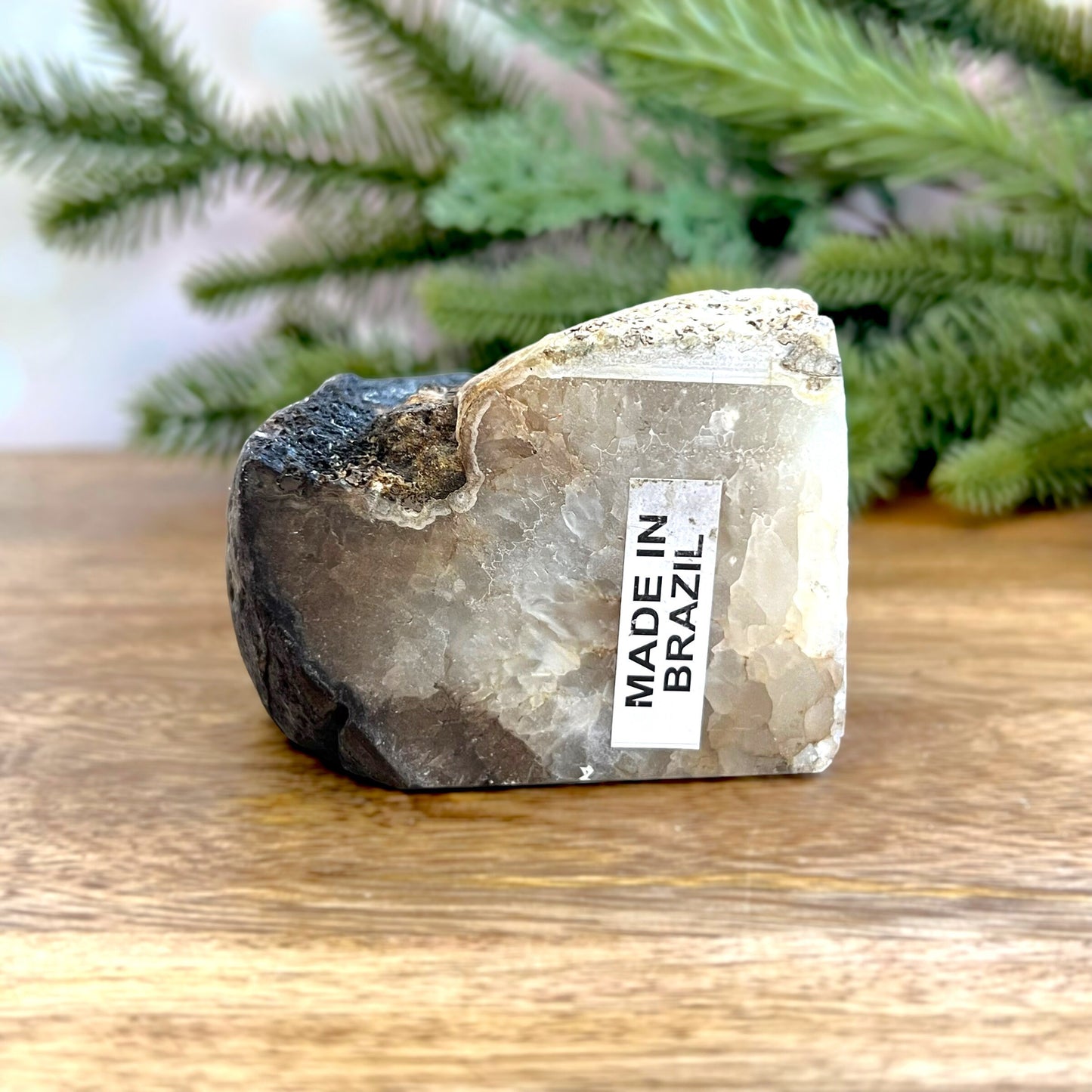 Natural Agate Bookend. Features a slice of cut crystal with raw geode edge and polished inside. Not dyed or heat treated.