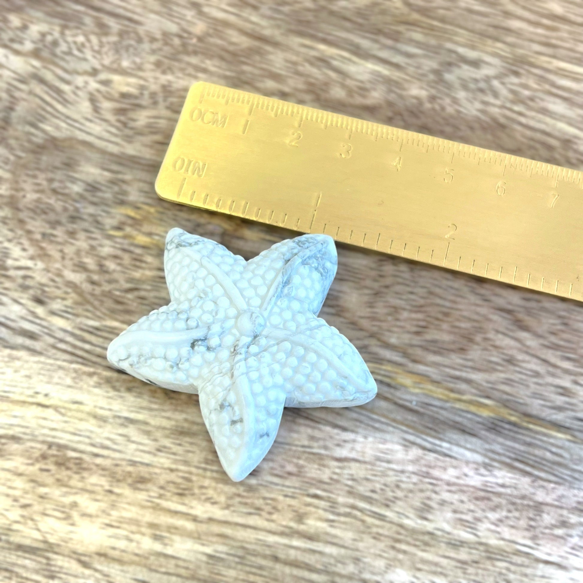 Natural and authentic Magnesite carved crystal cabochon. This Stone Cabochon has been carved into a starfish.