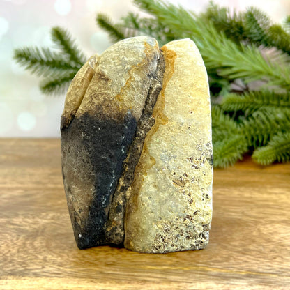 Natural Agate Bookend. Features a slice of cut crystal with raw geode edge and polished inside. Not dyed or heat treated.